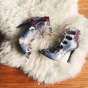 Zara snakeskin high-heel ankle lace-up bootie.